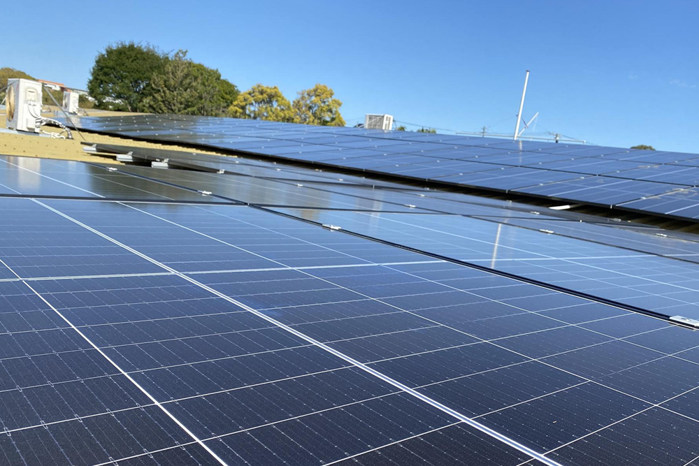 Close up view of the Y Cannon Hill Community Centre's solar panels on a sunny, blue sky day